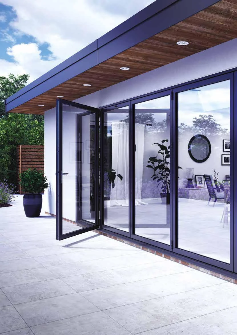 Korniche aluminium folding doors with a traffic door open towards a patio