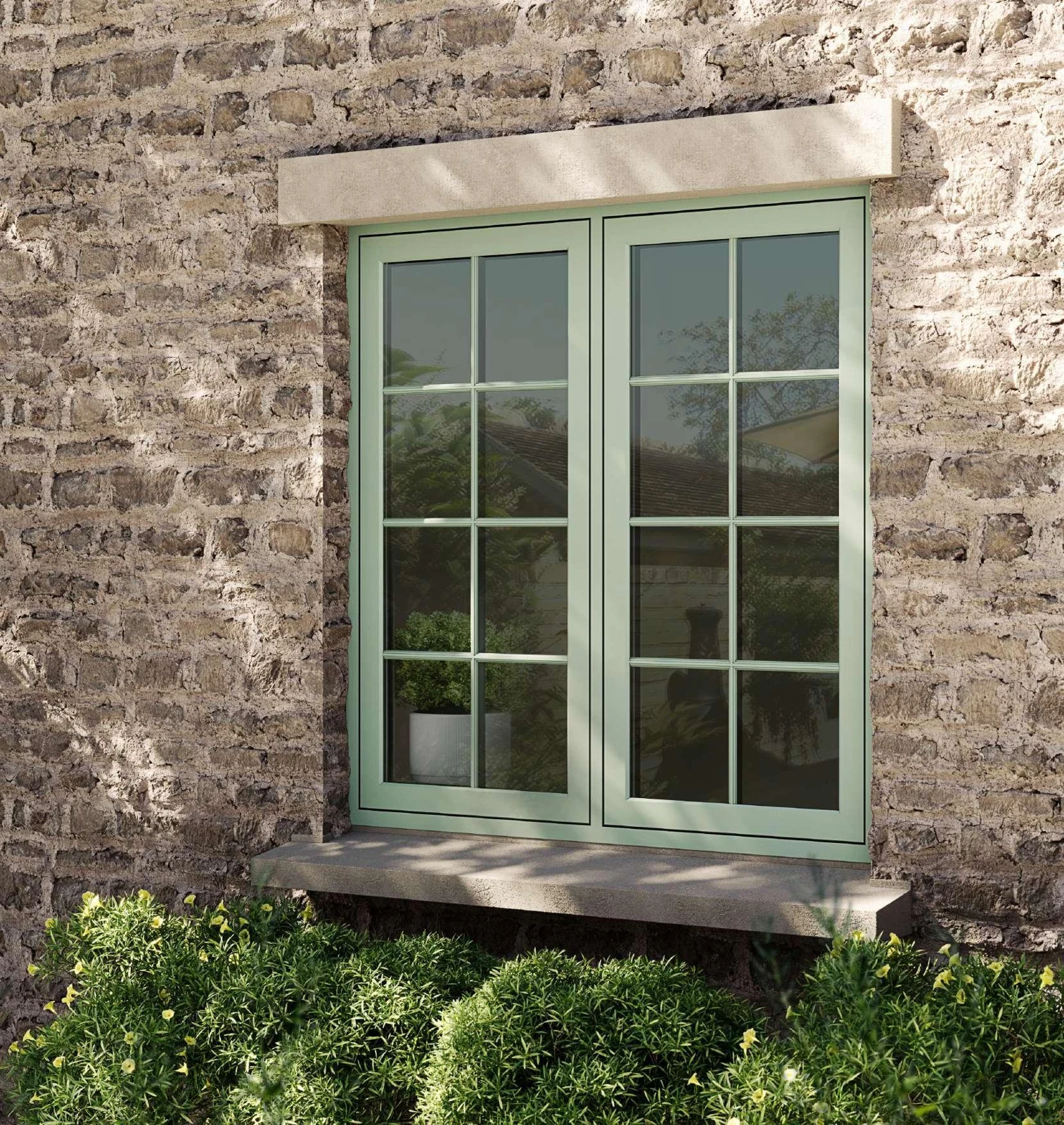 Chartwell Green flush window with Georgian bars in a stone wall